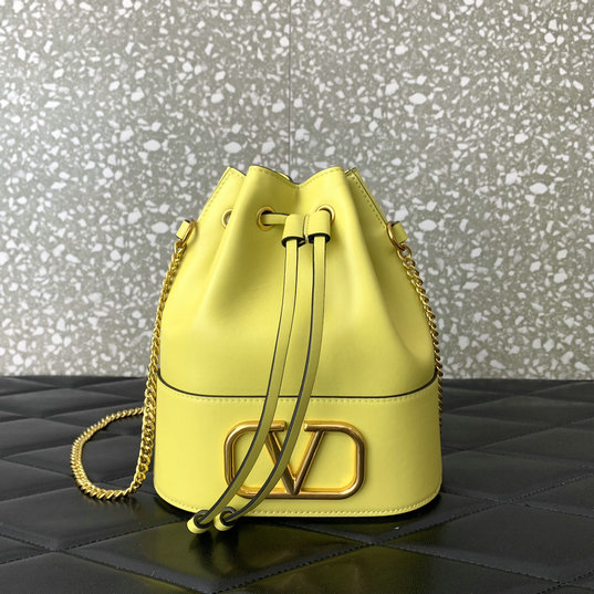 2023 Valentino VLogo Signature Mini Bucket Bag in yellow nappa leather